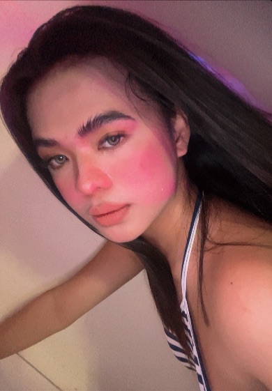 Flirty video chat portrait in soft light