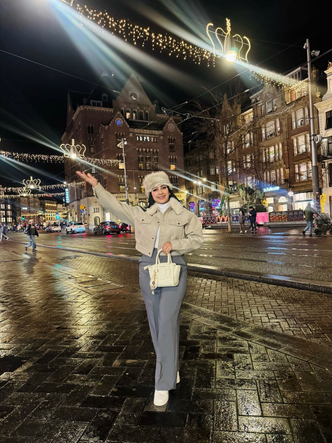 Woman waving in a city square, used beside polite greeting and exit advice